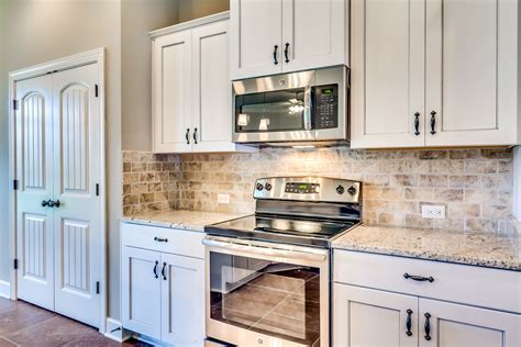 bodycon off white cabinets with stainless steel handles|white marble cabinet hardware.